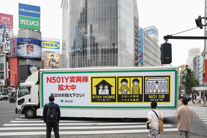 New Corona Infections: Third Emergency Declaration Extended Tokyo  N501Y Coronavirus variation is spreading, please refrain from going outside   Is written on a truck organized by the Tokyo City Government to inform the public on the ongoing dangers of the Covid 19 pandemic.