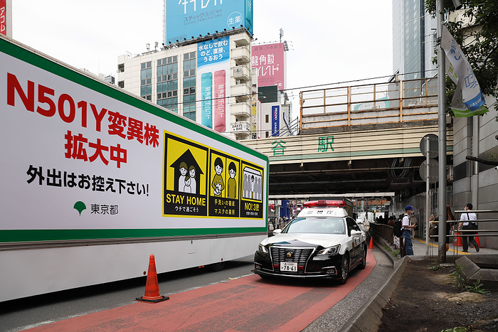 New Corona Infections: Third Emergency Declaration Extended Tokyo  N501Y Coronavirus variation is spreading, please refrain from going outside   Is written on a truck organized by the Tokyo City Government to inform the public on the ongoing dangers of the Covid 19 pandemic.