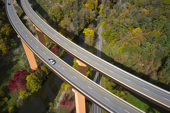 Drone Aerial West Virginia Highway 48 USA, West Virginia, Aerial view of U.S. Route 48 bridge stretching over Lost River in Appalachian Mountains, Photo by Cameron Davidson
