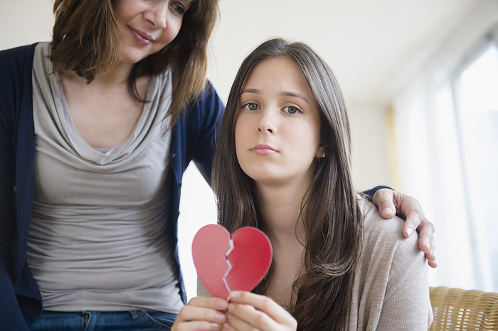 Mom comforting her heartbroken teenage daughter (14-15)