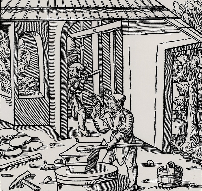 Refining copper in a furnace.  Basle, 1556  Refining copper in a furnace. In the foreground a coating of copper is being hammered off an iron bar. This was a method of testing to see if the metal was sufficiently refined. From  De re metallica , by Agricola, pseudonym of Georg Bauer  Basle, 1556 