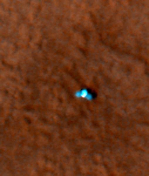 Phoenix lander on Mars, satellite image Phoenix lander  blue  on Mars, satellite image. The Phoenix spacecraft was launched on 4th August 2007, and landed on Mars on 25th May 2008. Phoenix is the first successful landing in a polar region of Mars, and is the sixth successful Mars landing. The mission s aim is to research the history of water on Mars and to evaluate the environment for evidence of microbial life on the planet. This image, taken soon after the landing, was obtained by the High Resolution Imaging Science Experiment  HiRISE  camera on the Mars Reconnaissance Orbiter  MRO  spacecraft.