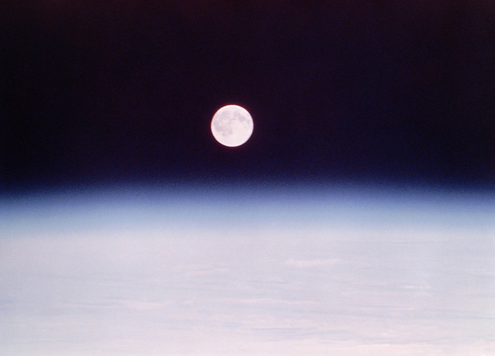 Skylab photo of full moon rising above airglow Skylab space station photograph of the full Moon rising above the airglow of Earth s atmosphere. Reflection of sunlight colours the airglow blue for the same reason that the sky is blue seen from the ground. The photograph was taken during the second manned period on Skylab from July 28 to September 25, 1973.