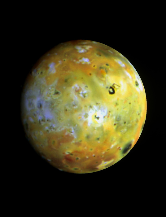 Galileo image of Jupiter s moon Io Io. Enhanced colour view of Io, innermost of the  Galilean  moons of Jupiter. The orange and yellow colours come from various forms and compounds of sulphur which cover most of the surface. The white areas are thought to be sulphur dioxide  frost . Just upper right of centre is a large black feature called Loki. This is thought to be a 250km wide lake of sulphur, with a large  raft  of solid sulphur floating in it. Loki is a volcanic feature, plumes of ejected material being seen in earlier Voyager images. This image was made in near infrared, green and ultraviolet light by the Galileo spacecraft in June 1996.