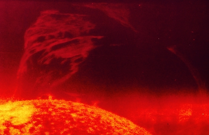 Solar prominence as seen by Skylab Skylab ultraviolet photo of arching active prominence showing large transient disturbance in outer corona.
