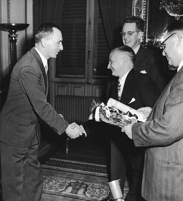 European Recovery Act, known as The Marshall Plan, the United States' programme for the rebuilding of Europe after World War II and to stop the spread of Communism. Beginning in 1947, the plan lasted for four years. Greek railway workers presenting the American Ambassador, Milton Katz, with a branch of an olive tree.