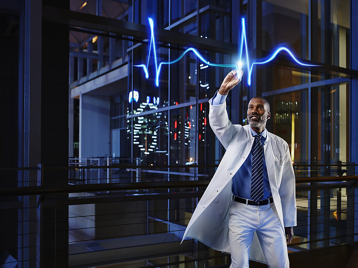 Medizin Lightpainting Male cardiologist analyzing pulse trace at hospital