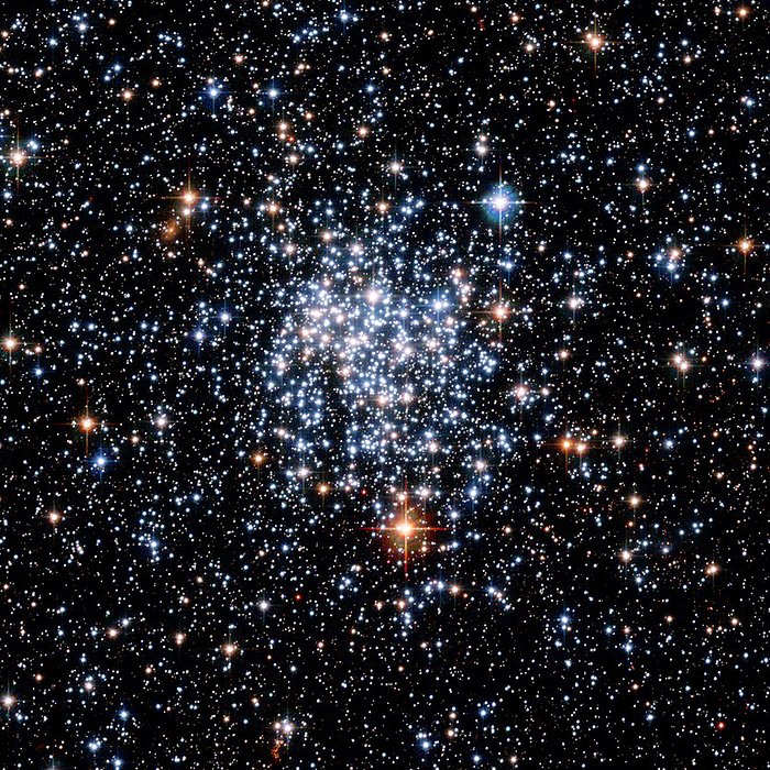 Open star cluster NGC 265 Open star cluster NGC 265. This cluster lies in the Small Magellanic Cloud, a dwarf galaxy orbiting our Milky Way. Spanning approximately 65 light years, the cluster is 200,000 light years from the Earth in the constellation Tucana. This image was taken by the Hubble Space Telescope  HST .