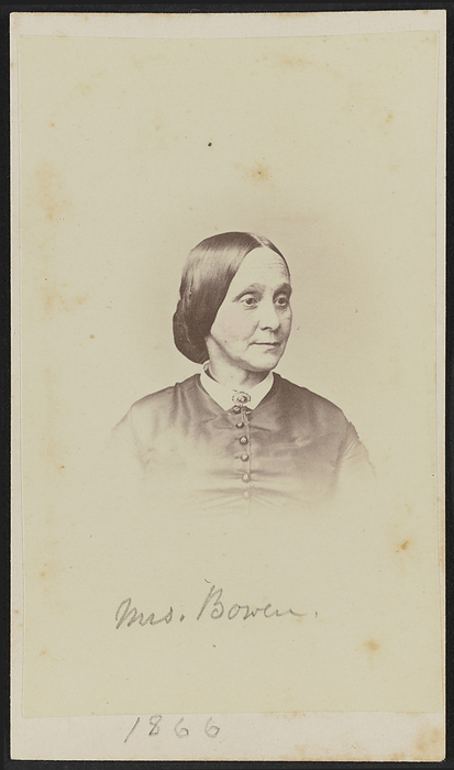 Carte de visite portrait of Mrs. Bowen, 1866. Creator: Henry Ulke. Carte de visite of Mary Barker Bowen shown in bust portrait. Her body faces the camera, but her head is turned a quarter to her left and she looks off camera. Her hair is parted at the center and pulled into a chignon at the nape of her neck. She wears a dark bodice with a white collar and an oval brooch at her front neck. The bottom portion of the image is purposefully faded in the popular style of the time. Handwritten in graphite on the bottom of the print is the name  quot Mrs. Bowen quot  with  quot 1866 quot  written below the print on the mount. There is a green and white 3 cent canceled revenue stamp on the back of the print featuring George Washington with HU   NY written over it in ink with Henry Ulke s mark printed above it. The photograph is housed in the album 2017.30. The album page has a triple lined, gold border framing the print. Handwritten in graphite at the lower left corner of the album page is the text  quot HENRY ULKE quot .