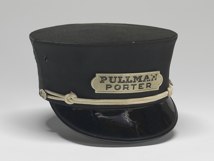 Uniform cap worn by Pullman Porter Philip Henry Logan, 1966. Creator: Unknown. A black cap with metallic braid trim and a label reading PULLMAN PORTER in black. Being a Pullman porter was one of the jobs that helped build the black middle class in America, and Pullman porters were key figures in the civil rights movement. The bill is made of black patent leather and a label inside the hat reads,  quot For: P.H. Logan   Date: 8 29 66   No. J 585054. quot 