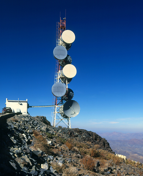 Telecommunications tower La Silla Chile Telecommunications tower. Microwave transmissions relay tower with an assortment of dishes. Micro  waves can be used to relay transmissions of telephone, telex and data communications. Relay stations are used because microwave transmissions require a clear line of sight between the sending and receiving locations. Photographed at La Silla observatory in Chile.
