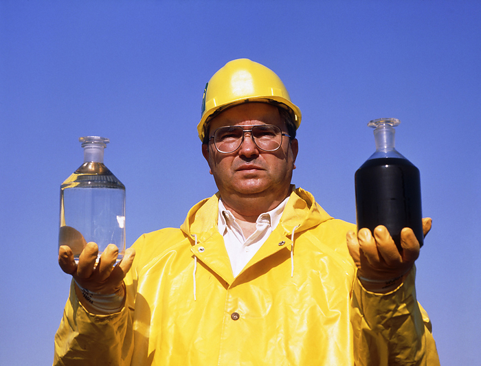 Worker holds treated and untreated sewage samples Sewage treatment. Worker holds samples of treated and untreated sewage. Sewage treatment involves using mechanical filtering and bacterial action to remove organic materials from water. The bacteria may then be filtered out before the water is discharged into a river or the sea.
