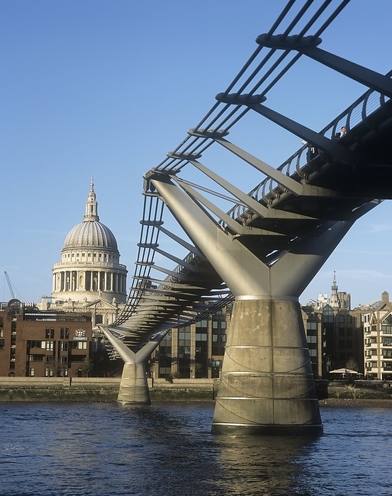 London Millennium Bridge London Millennium Bridge. This suspension bridge crosses the River Thames in London, England. It is a pedestrian bridge, allowing people to walk from the Tate Modern art gallery on the south bank, to St Paul s Cathedral  centre left . The bridge is 325 metres long. It was designed by the architects Norman Foster Associates, along with sculptor Anthony Caro, and constructed by engineers Ove Arup and Partners. It was opened on 10th June 2000, but was closed when excessive numbers of people caused the bridge to sway from side to side. Dampers were fitted to fix this, and the bridge reopened on 22nd February 2002.