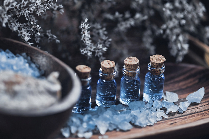 Aromatherapy oils Aromatherapy. Close up photo of wooden and blue spa setting for aromatherapy., Photo by MICROGEN IMAGES SCIENCE PHOTO LIBRARY