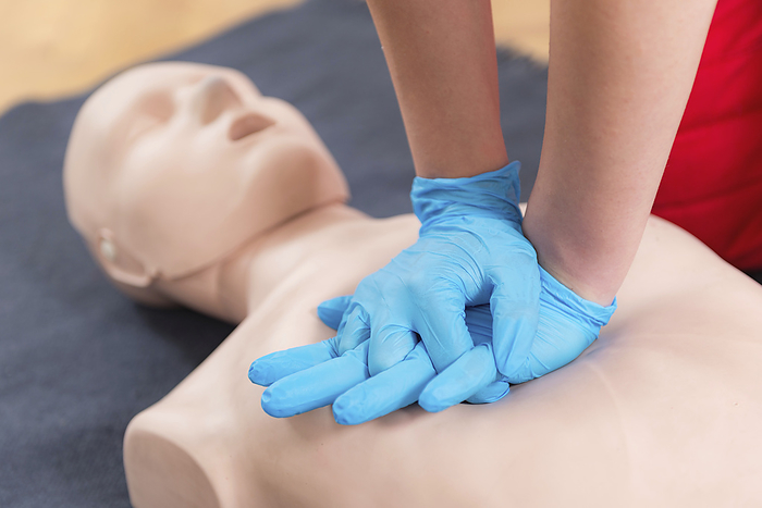 Cardiopulmonary resuscitation First Aid Training. Cardiopulmonary resuscitation. First aid course on cpr dummy., Photo by MICROGEN IMAGES SCIENCE PHOTO LIBRARY