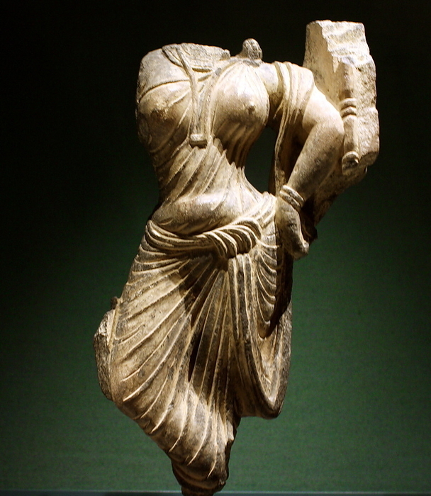 Female figure, Gandhara, AD 100-200.  Schist relief fragment.