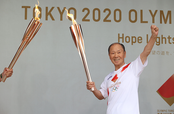 2020 Tokyo Olympics Torch Relay July 9, 2021, Tokyo, Japan   Japanese legendary gymnast Takashi Ono who won 13 medals including 5 golds and 1964 Tokyo Olympics Japanese delegation captain raises his fist after a torch kisses at the Olympic torch relay event in Tokyo on Friday, July 9, 2021. Tokyo 2020 Olympics torch relay started in Tokyo on July 9, two weeks before the opening of the Olympic Games.    Photo by Yoshio Tsunoda AFLO  