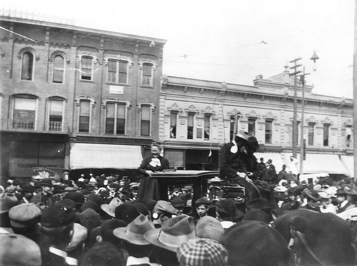 Prohibition advocate Carrie Nation, known for smashing up saloons, was mocked by students at a rally in 1902 on State street at north university. Excessive student drinking and rowdy behaviour had made a paid police force necessary by 1871. Cook's temperance hotel and Maynard's 'temperance saloon' mirrored the national movement opposed to alcohol. in 1903 the city adopted a 'dry line' prohibiting the sale of alcohol East of Division Street. though Ann Arbor celebrated the end of prohibition in 1933, hard liquor was available only in private clubs such as the town club and the elks until 1960. the dry line was abolished by 1969.