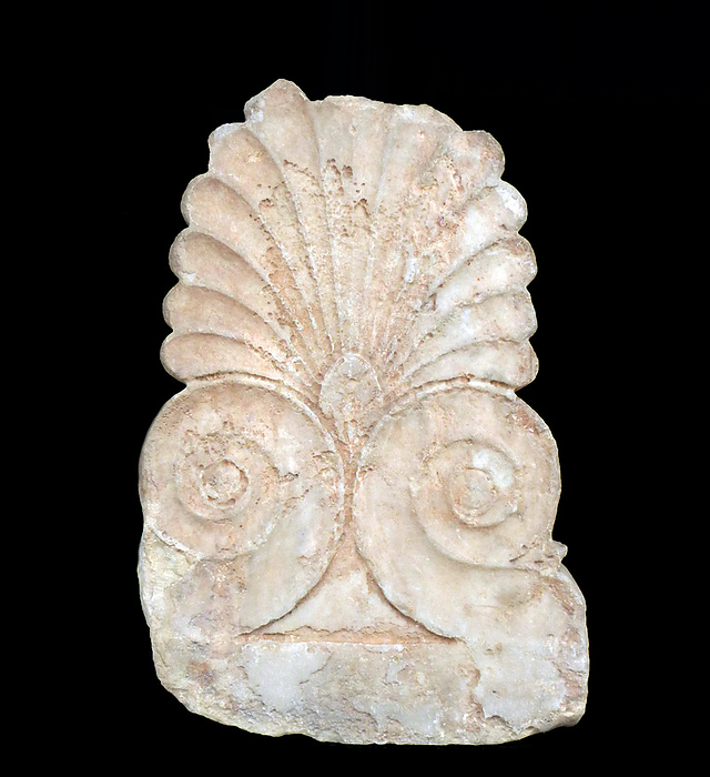 marble antefix from the Parthenon temple, Athens. The decorations comprise spirals and leaf patterns