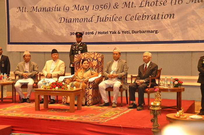 Mr. Hinokida, a member of the summit team, at the commemoration ceremony for the 60th anniversary of the first ascent of Manaslu with Nepalese President Bhandari and others. Minoru Hinokida  far right , a member of the climbing team, at the commemorative ceremony with President Bidya Deby Bhandari  center  and others.
