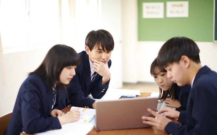 Japanese junior high school students doing group work
