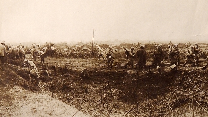 French troops returning from the front World War 1. French troops returning from the front crossing through a ravaged landscape in North Eastern France c.1916.