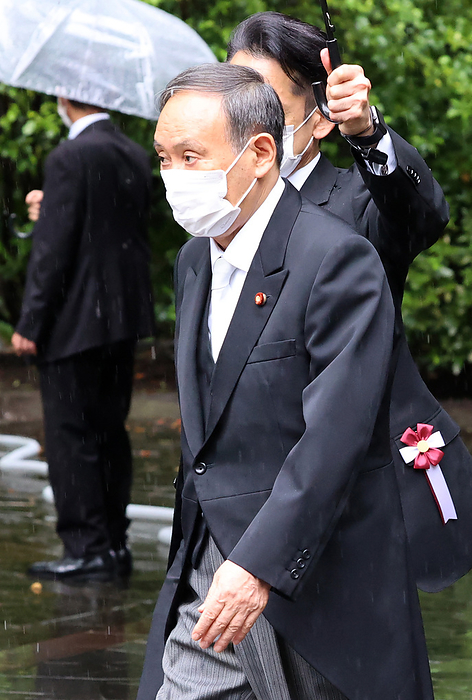 Japan marked the 76th anniversary of its surrender of WWII. August 15, 2021, Tokyo, Japan   Japanese Prime Minister Yoshihide Suga leaves the Chidiorigafuchi National Cemetery after he offered a flower bouquet for war victims in Tokyo on Sunday, August 15, 2021. Japan marked the 76th anniversary of its surrender of WWII.     Photo by Yoshio Tsunoda AFLO 