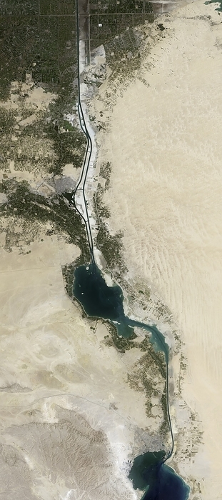New Suez Canal, satellite image Satellite image taken nine months after the completion of the Suez Canal Area Development Project. This project, completed in 2015, included the addition of a new canal lane and the deepening of the existing canal area. Image obtained by the Operational Landsat Imager  OLI  on the Landsat 8 satellite., Photo by NASA SCIENCE PHOTO LIBRARY