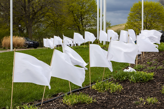Memorial to Covid 19 victims White flags outside the city hall representing the residents of Troy, Michigan, USA who died in the coronavirus pandemic., Photo by JIM WEST SCIENCE PHOTO LIBRARY