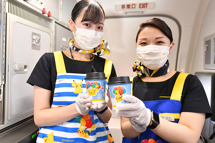 Skymark s specially painted aircraft,  Pikachu Jet BC,  goes into service Skymark Airlines flight attendants holding special paper cups on board the Pikachu Jet BC  737 800, JA73AB , on June 21, 2021. PHOTO: Tadayuki YOSHIKAWA Aviation Wire