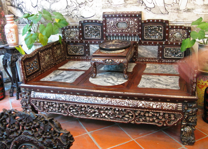 Opium-sucking sofa at Pranakan Mansion, George Town, Penang Island, with fan feather coverings.
