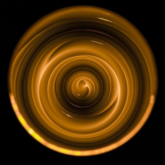 Reflection inside a neutron guide, abstract image Reflection inside a neutron guide, abstract image. Neutrons are fundamental particles found in atomic nuclei. Typically emitted by a suitable radioactive source or nuclear reactor, neutrons have applications in various areas of physics, particularly the field known as neutron optics. Neutron guides are constructed from precisely engineered layers of metals that reflect the neutrons, which are acting as waves. Examples of neutron optics include neutron spectrometry, neutron diffraction, neutron scattering, and neutron tomography. This neutron guide is coated with the isotope nickel 58.