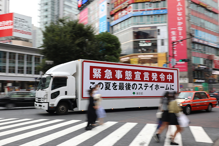 People visit Tokyo s Shibuya, Ginza and Asakusa district while the government is expecting to remove the state of emergency in this week September 26, 2021, Tokyo, Japan   An advertisement truck carries a state of emergency at Tokyo s Shibuya fashion district on Sunday, September 26, 2021. Japanese government is expecting to remove the COVID 19 state of emergency in this week.       Photo by Yoshio Tsunoda AFLO 