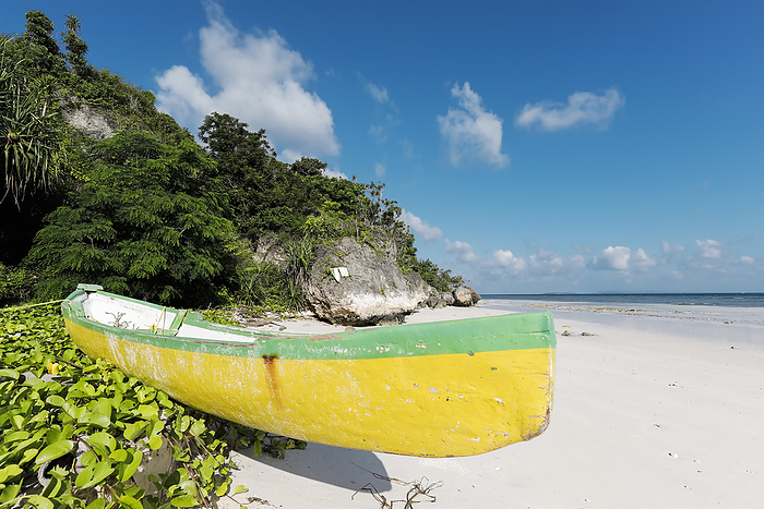 Colourful old canoe on beautiful white sand Bira Beach at this far South resort town  Tanjung Bira, South Sulawesi, Indonesia Colourful old canoe on beautiful white sand Bira Beach at far South resort town, Tanjung Bira, South Sulawesi, Indonesia, Southeast Asia, Asia, Photo by Robert Francis