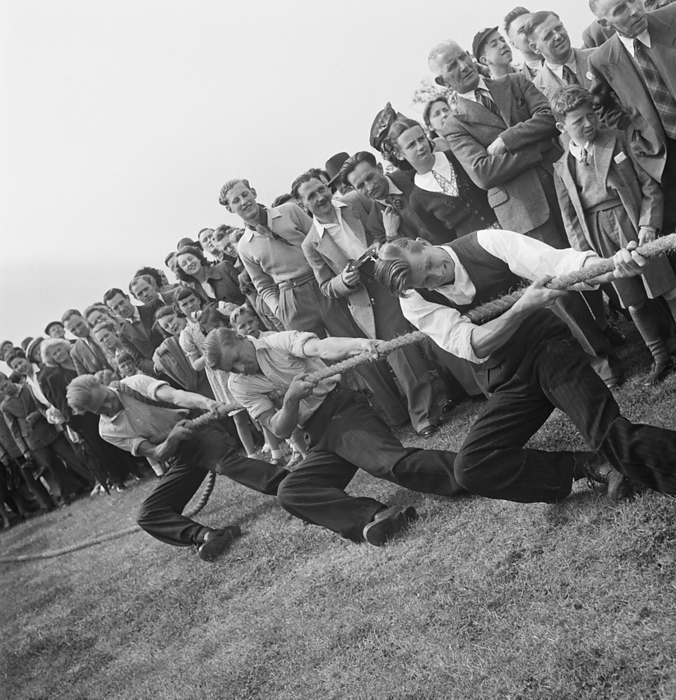 Sports Ground, Elstree, Elstree and Borehamwood, Hertsmere, Hertfordshire, 21 05 1949. Creator: John Laing plc. A crowd of people watching a tug of war match during the opening of a new sports ground at Elstree. This photograph was taken at Elstree during the opening of a new sports ground for the company, with the opening ceremony being carried out by Mr K Laing.