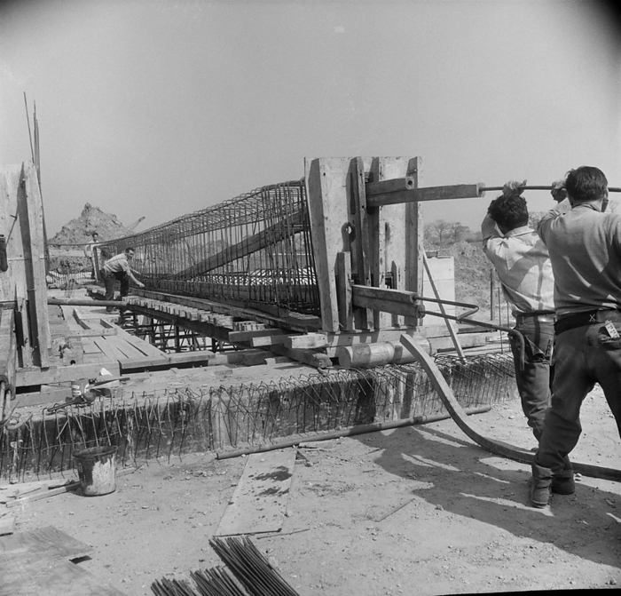 Construction of the Birmingham to Preston Motorway  M6 , Staffordshire, 01 05 1962. Creator: John Laing plc. A team of workers making a bridge beam during the construction of the Birmingham to Preston Motorway  M6 . This image was catalogued as part of the Breaking New Ground Project in partnership with the John Laing Charitable Trust in 2019 20.