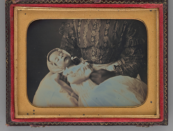 Untitled  Portrait of a Sleeping Baby in a Woman s Lap , 1851. Creator: W. A. Pratt. Untitled  Portrait of a Sleeping Baby in a Woman s Lap , 1851. A white baby in a bonnet and gown sleeping in the lap of a black woman. Only the woman s hands, patterned dress and apron are visible. Daguerreotype.