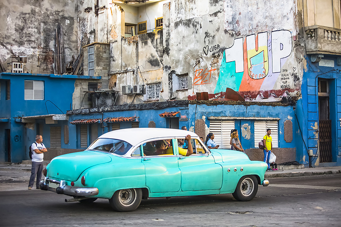 Street scenes through the old city of Havana, Cuba. A unique motor taxi takes people around Havana; Havana, Havana, Cuba, Photo by Micah Wright / Design Pics