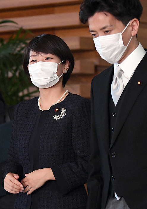 Takako Suzuki  left  and Fumiaki Kobayashi, who have been nominated as deputy foreign minister and deputy digital minister, respectively, head to the Imperial Palace. Takako Suzuki  left , who was unofficially appointed deputy foreign minister, and Fumiaki Kobayashi, who was unofficially appointed deputy digital minister, head to the Imperial Palace, at the Prime Minister s Office, October 2021. Photo by Mikiharu Takeuchi, 3:38 p.m., October 6, 2021