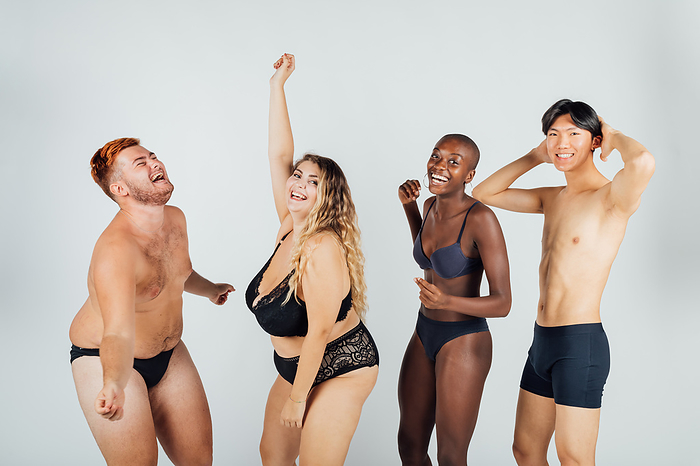Group of young people dancing, wearing underwear Group of young people dancing, wearing underwear
