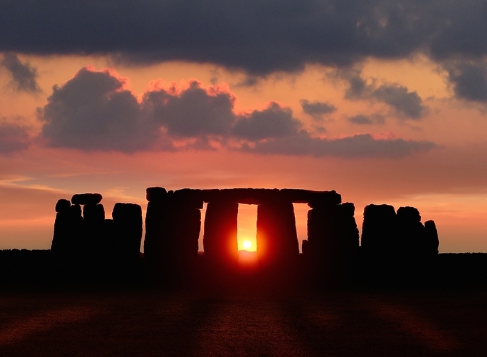 Sunset at Stonehenge Sunset at Stonehenge. Stonehenge is an ancient arrangement of large standing stones on Salisbury Plain, UK. It is thought to have been built around 2000 BC by neolithic peoples. Some of the stones are thought to form markers that indicate rising and setting points for the Sun and the Moon, allowing accurate prediction of forthcoming lunar and solar eclipses., Creditline:DETLEV VAN RAVENSWAAY SCIENCE PHOTO LIBRARY