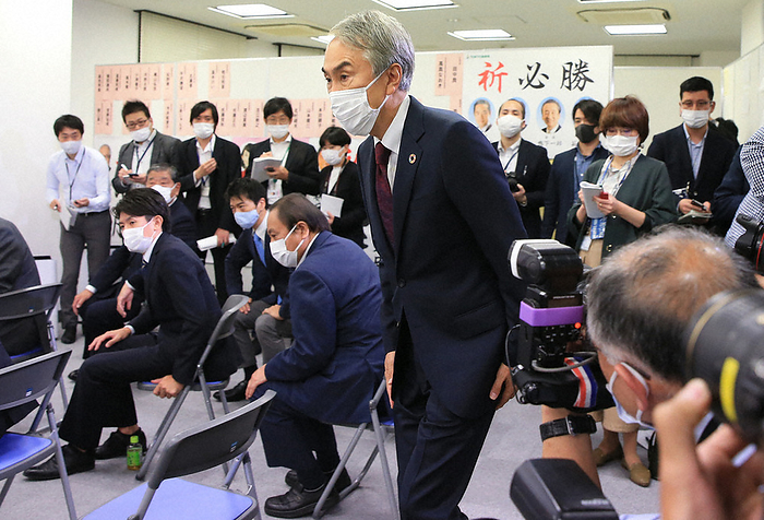 2021 House of Representatives Election Date Nobuteru Ishihara  center  enters his office where his supporters are waiting for him after he was declared unsuccessful in the primary election.