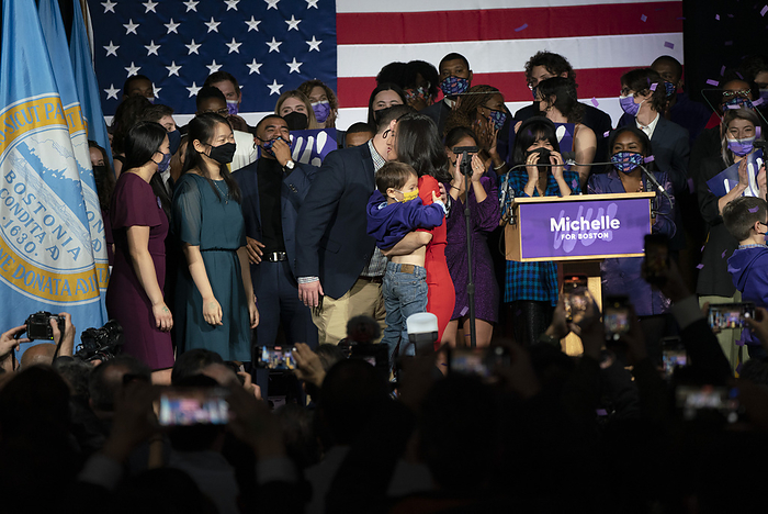 Michelle Wu wins Boston mayoral race  November 2, 2021, The cyclorama building, Boston, Massachusetts, USA: Michelle Wu receives a hug from her husband Conor Pewarski as she holds her son Cass after winning her race for Mayor of Boston, to become the first woman and first person of color to be elected to the office, in Boston, Massachusetts, USA.   Photo by Keiko Hiromi AFLO  