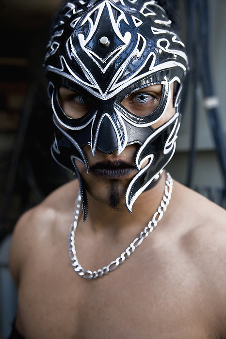 pro wrestler Hispanic man wearing Mexican wrestling mask