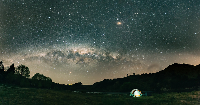 Panoramic view of beauriful night landscape with tent in New Zealand Panoramic view of beauriful night landscape with tent in New Zealand