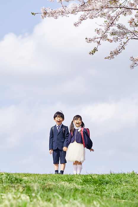 Japanese elementary school students holding hands