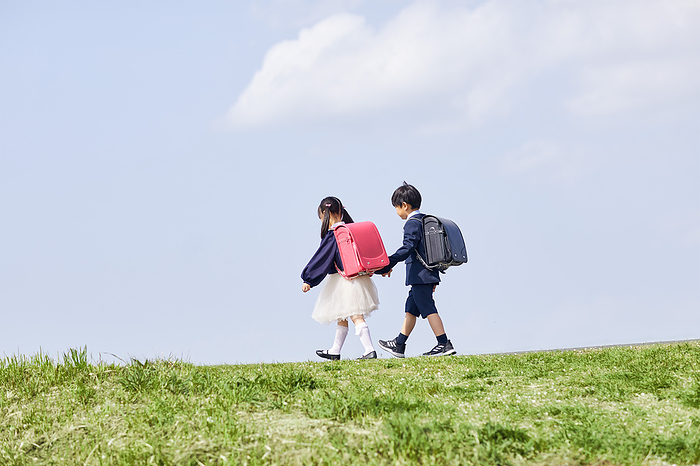 Walking Japanese elementary school students