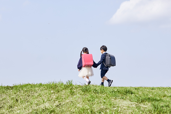 Walking Japanese elementary school students