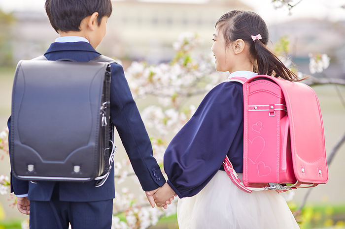 Japanese elementary school students holding hands