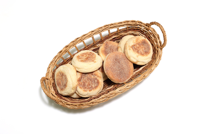 English muffins in baskets with white background